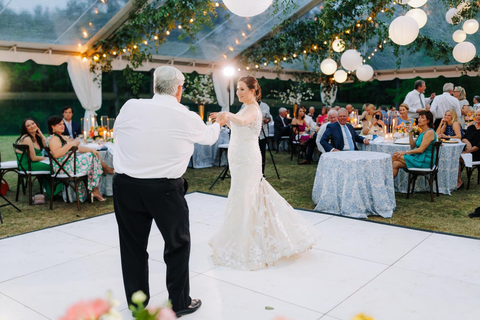 All white dance floor set up at an outdoor garden wedding reception near Philadelphia